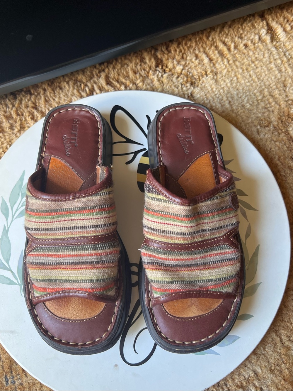 Born brown leather and multi-color woven striped textile comfort slide sandals.